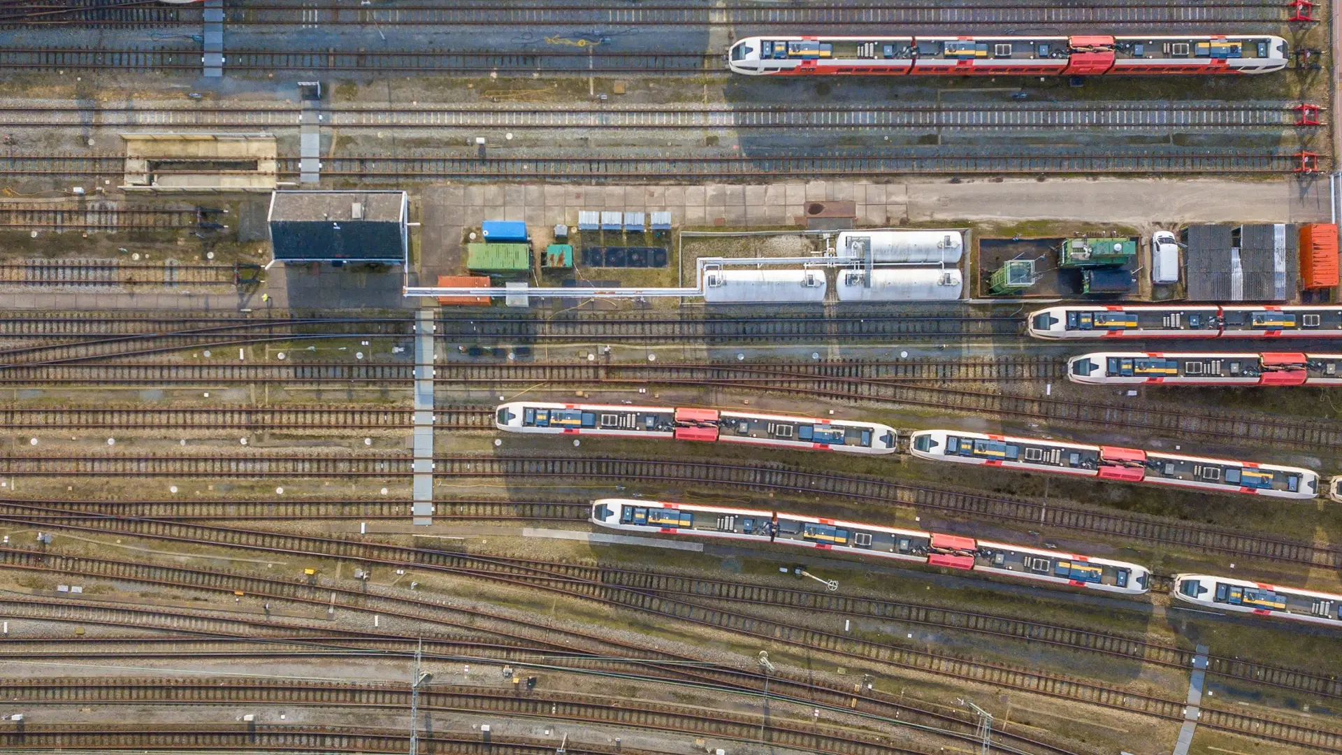 Trains at railroad yard at station district aerial in Netherlands
